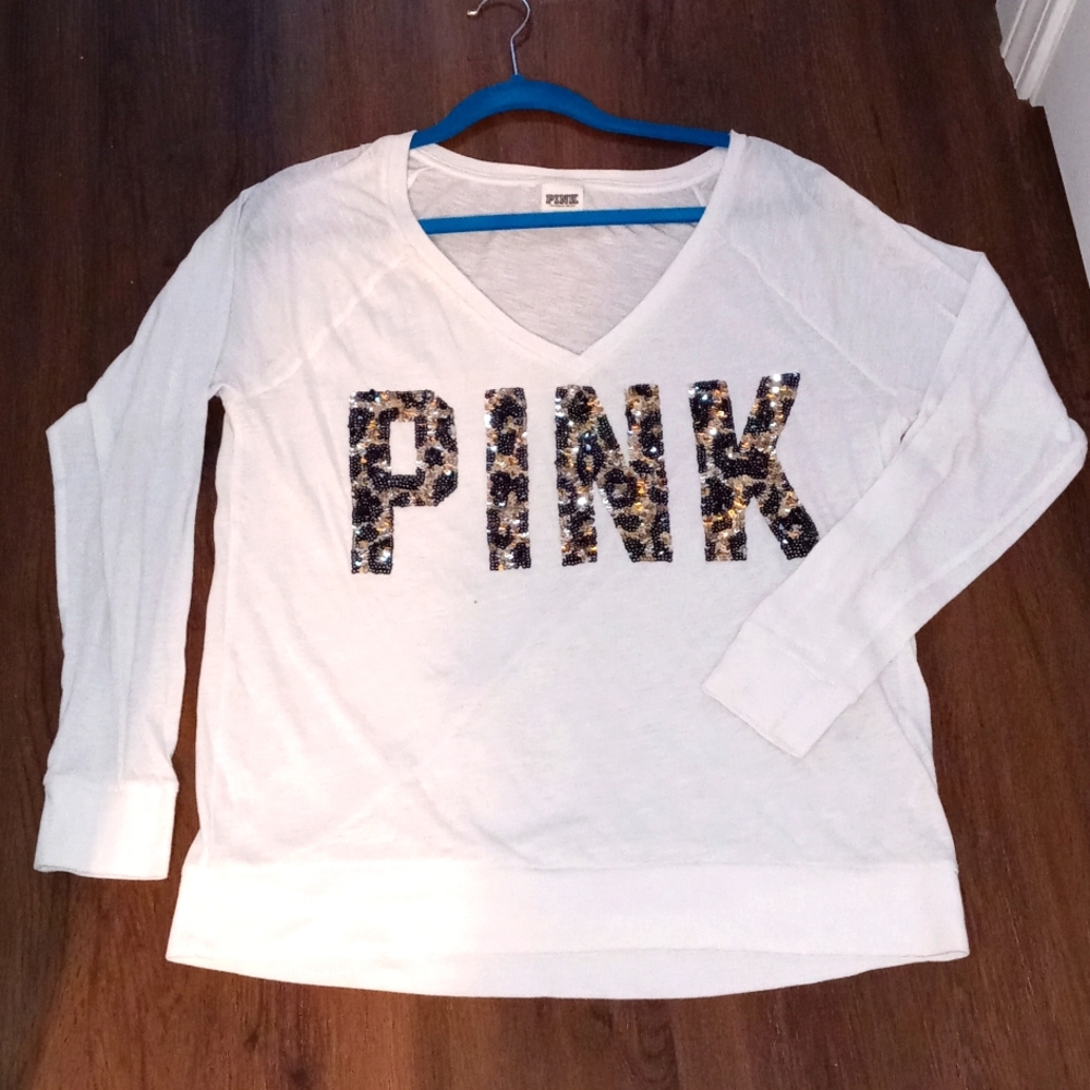 Victoria's Secret Pink long sleeve t-shirt. Pink written in cheetah print sequin